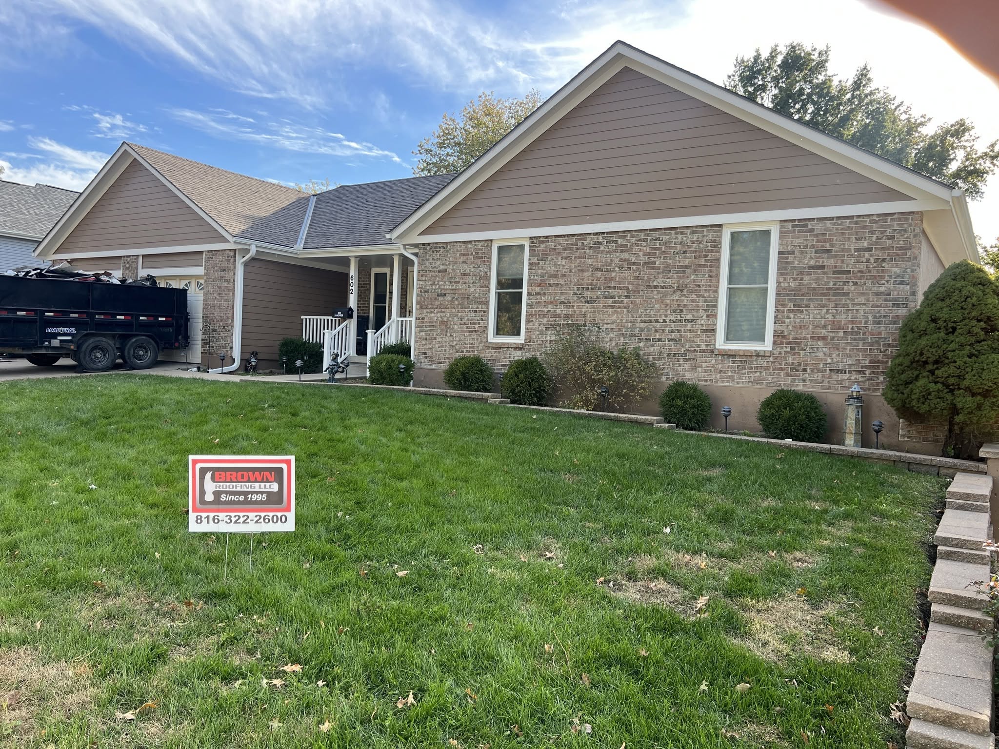 Full asphalt shingle reroof completed by Brown Roofing LLC, Kansas City residential roofing project.